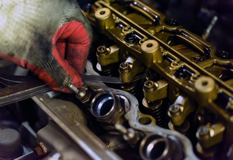 Maintenance check and adjust valve lash in car engine